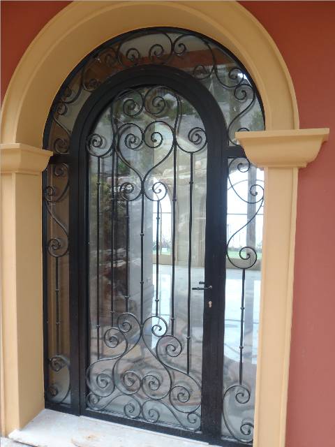 Porte vitrée volutes 2